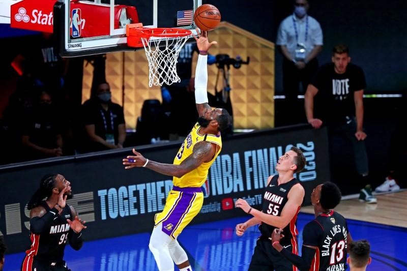 Los Angeles Lakers forward LeBron James (23) shoots the ball against Miami Heat guard Duncan Robinson (55) during the third quarter in game 4 of the 2020 NBA Finals at AdventHealth Arena. (USA TODAY Sports Photo via Reuters)